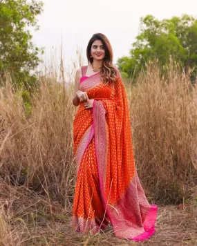 Incomparable Orange Soft Banarasi Silk Saree With Twirling Blouse Piece