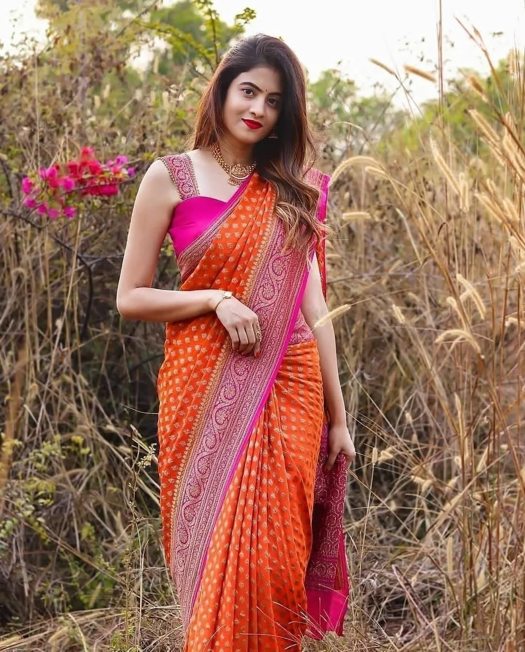 Incomparable Orange Soft Banarasi Silk Saree With Twirling Blouse Piece